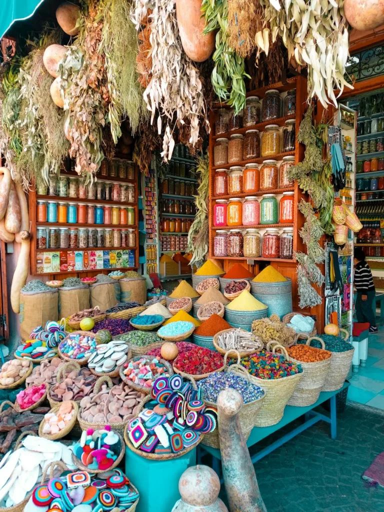 Baskets of spices and dried flowers in a Moroccan souk