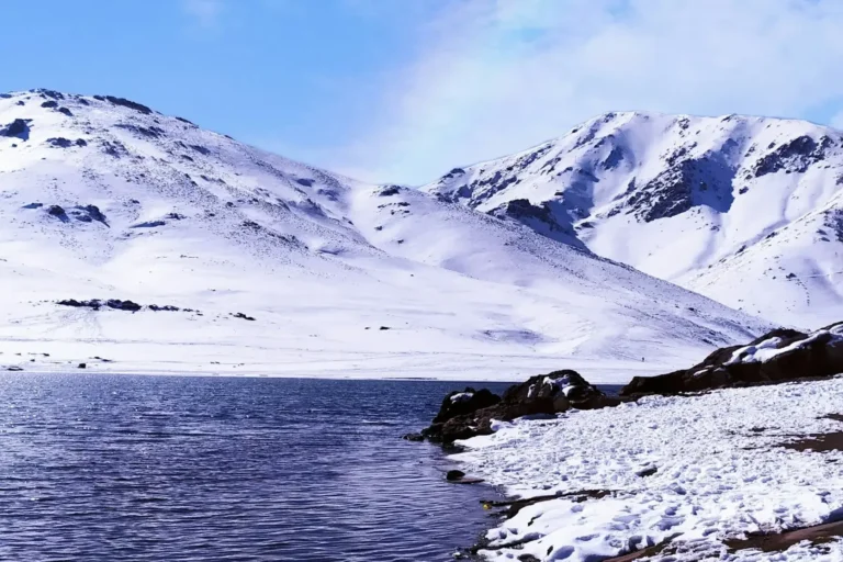 Snow-capped peaks above the lake at Oukaimeden